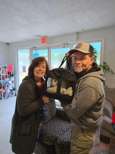 Shelley and Gregg adopting Tigger